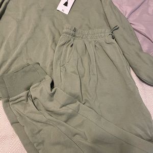 Green jogger set, never worn, tag still on